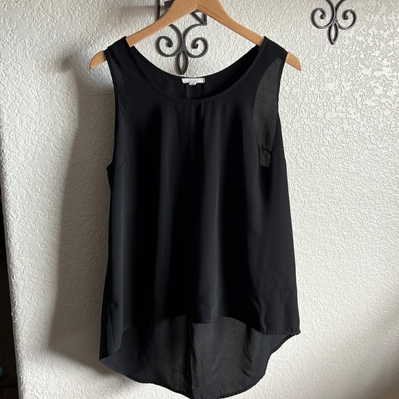 Pleione Tops - Black Pleione XL tank with hi-low hem. EUC